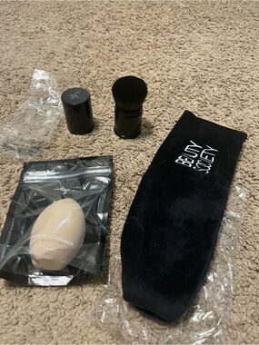 Makeup sponge, headband and retractable brush